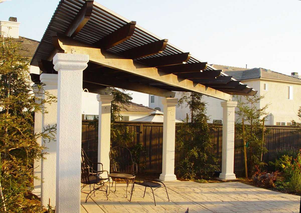 Custom aluminum lattice patio cover installed in a Sacramento backyard by West Coast Awnings